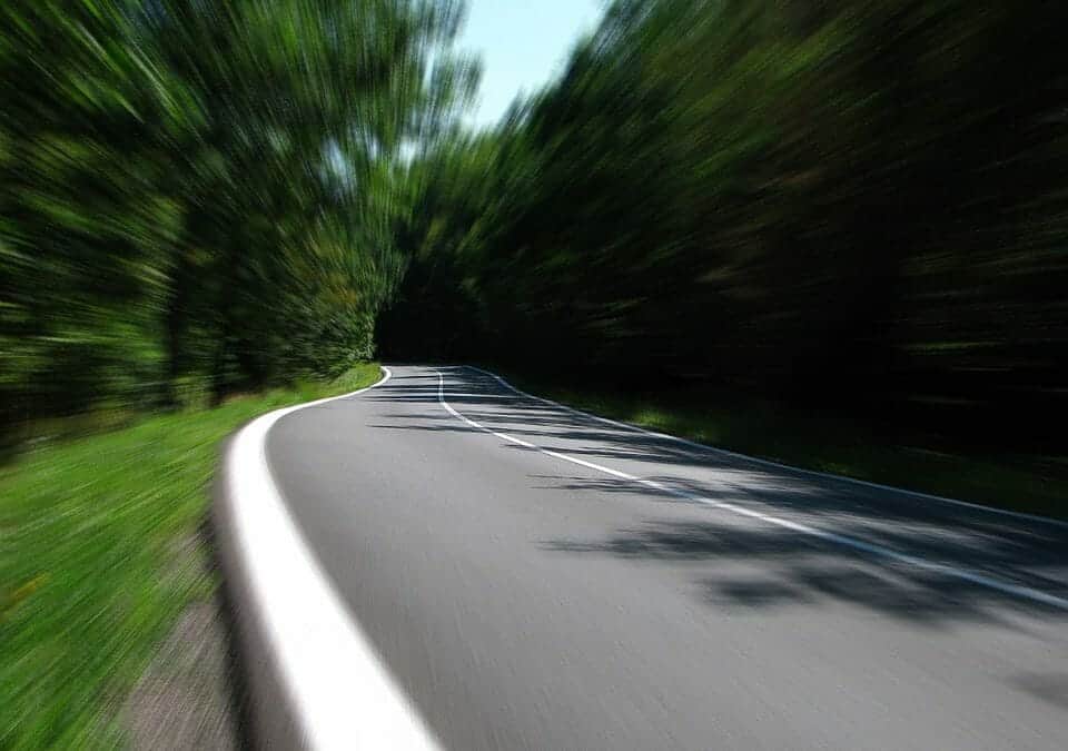 A winding two-lane road.