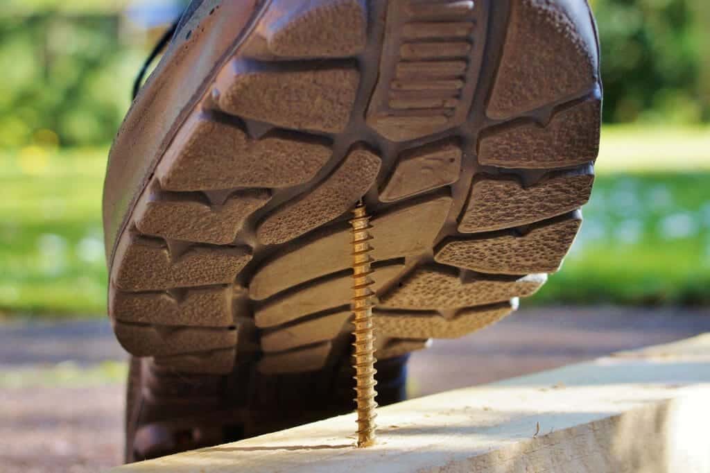 boot stepping on screw